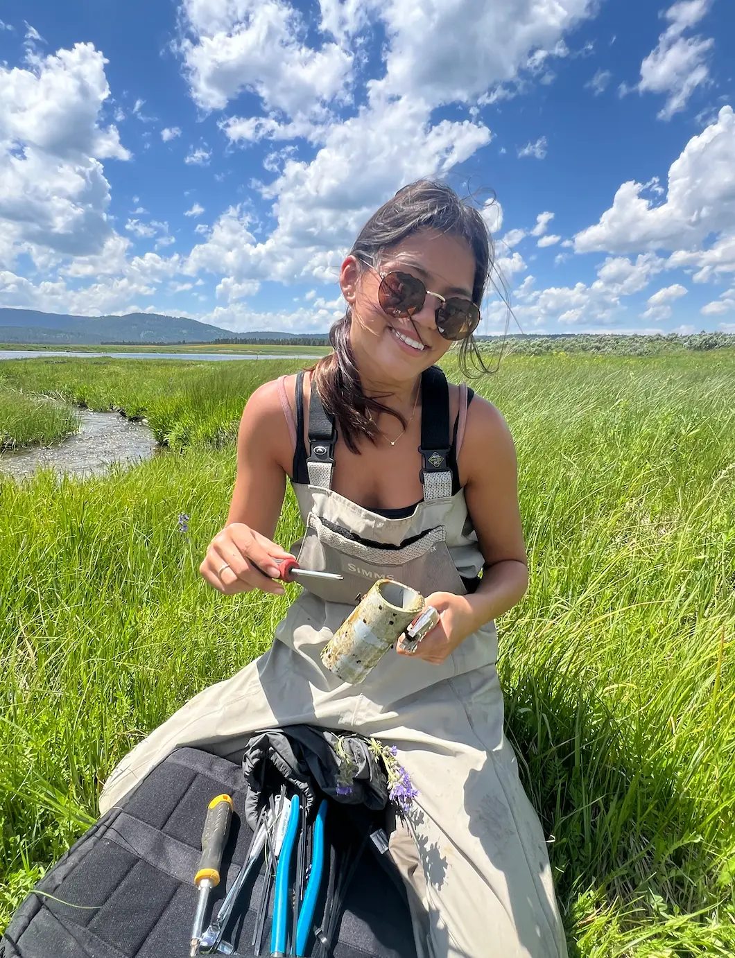 Woman taking dirt samples