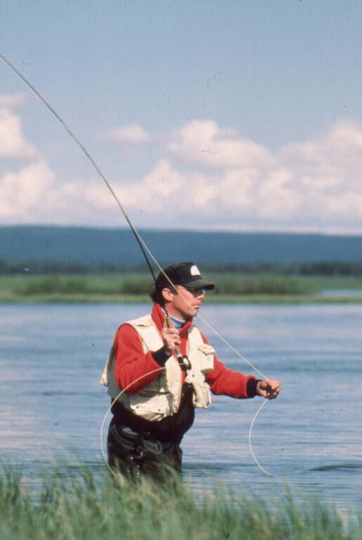 man fly fishing