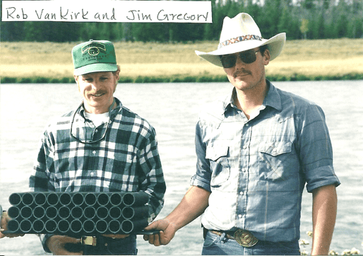 2 men standing in river